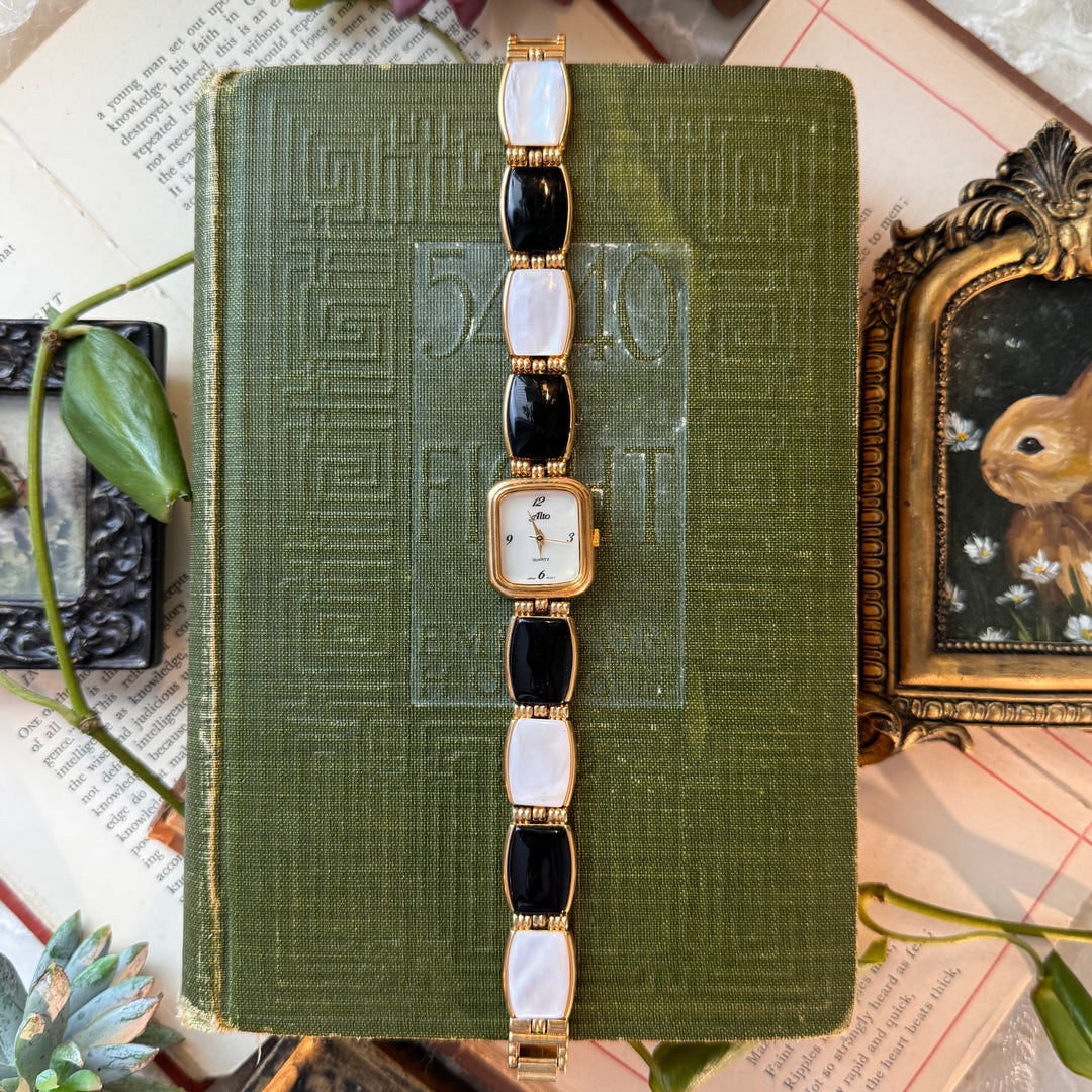 Gold Watch with Black and White Band
