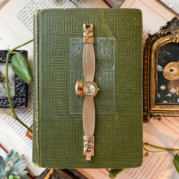 Gold Watch with Peekaboo Face