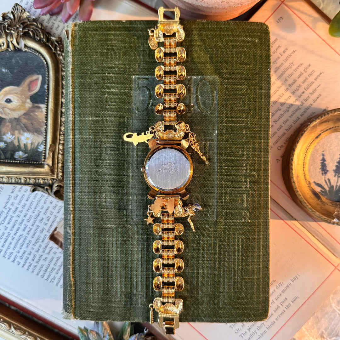 Gold Kirks Folly Charm Watch