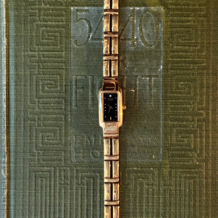 Gold Watch with Black Face