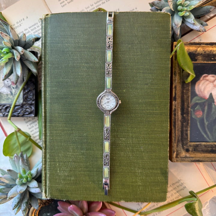 Silver Watch with Green Accents