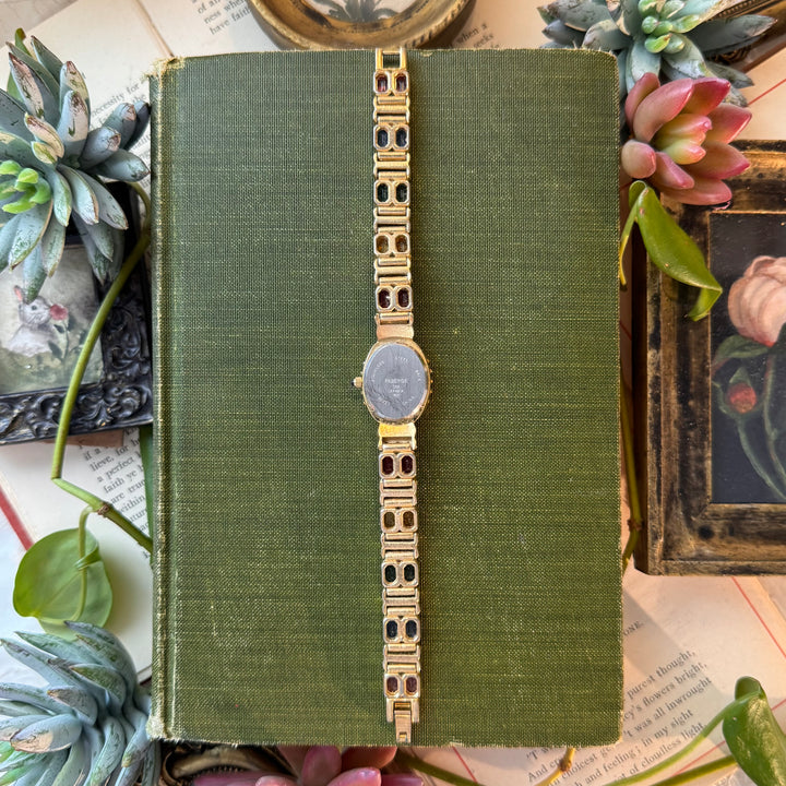 Gold Watch with Multicolored Stones