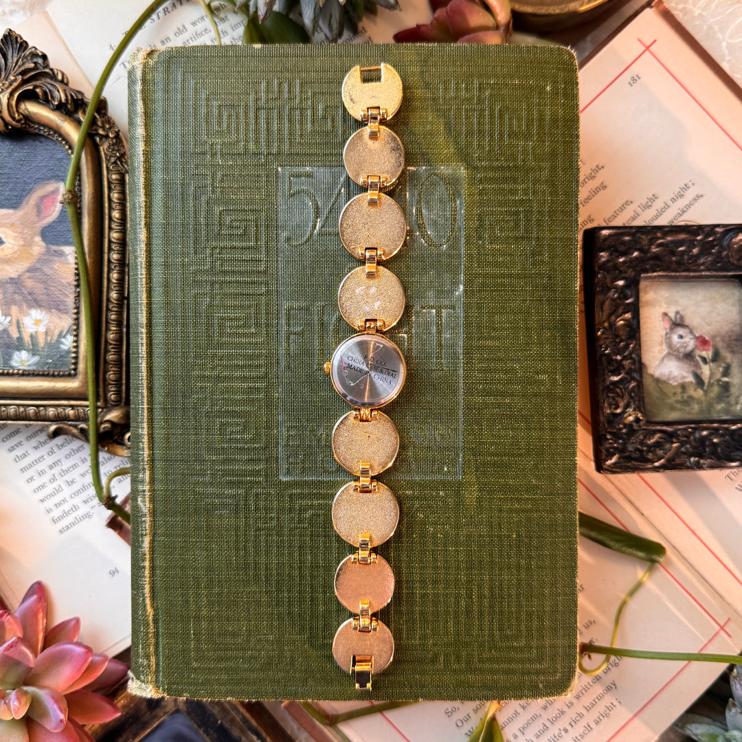 Gold Watch with Bird Accents